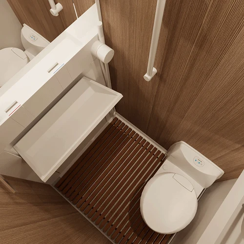 Top-down view of the HIP Campers 4Family bathroom with wooden floor slats and toilet